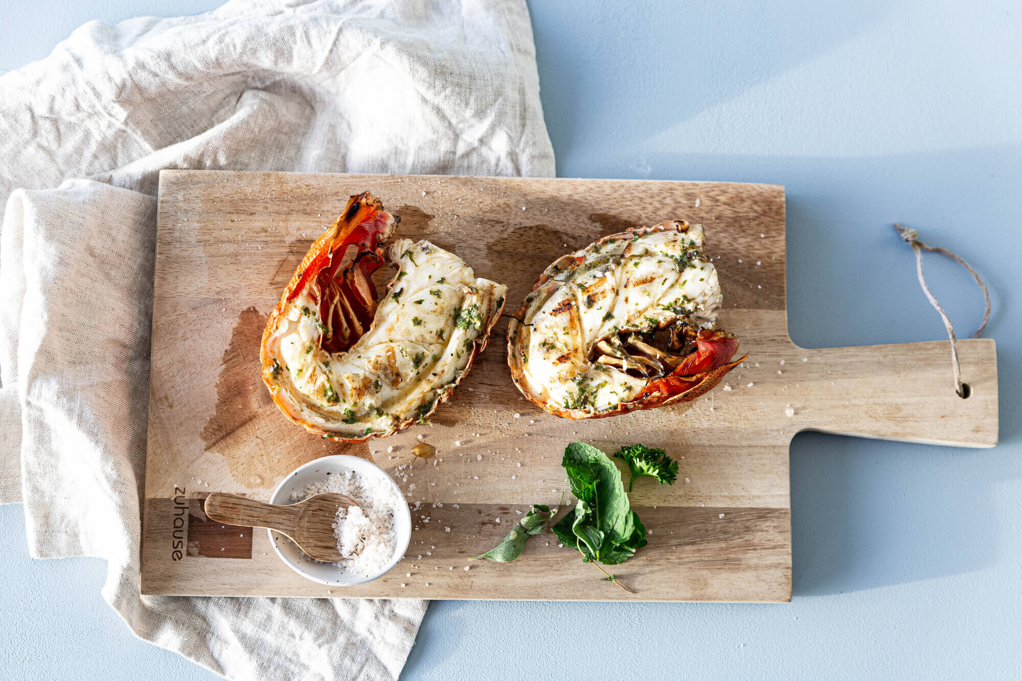 Wild-sustainable-BBQ-rock-lobster-with-salsa-verde-butter Wild sustainable BBQ rock lobster with salsa verde butter