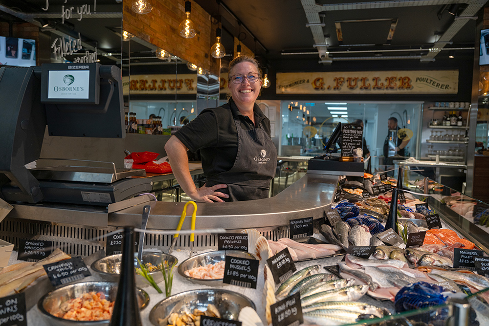 Women standing behind the counter at Osborne fishmongers